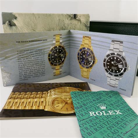 vendita scatola rolex 68.00.55 date submariner usata con libretti